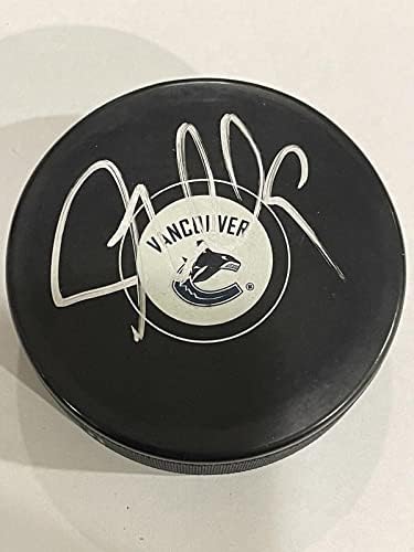 JT J.T Miller Signed Autographed Vancouver Canucks Hockey Puck b – Autographed NHL Pucks post thumbnail image